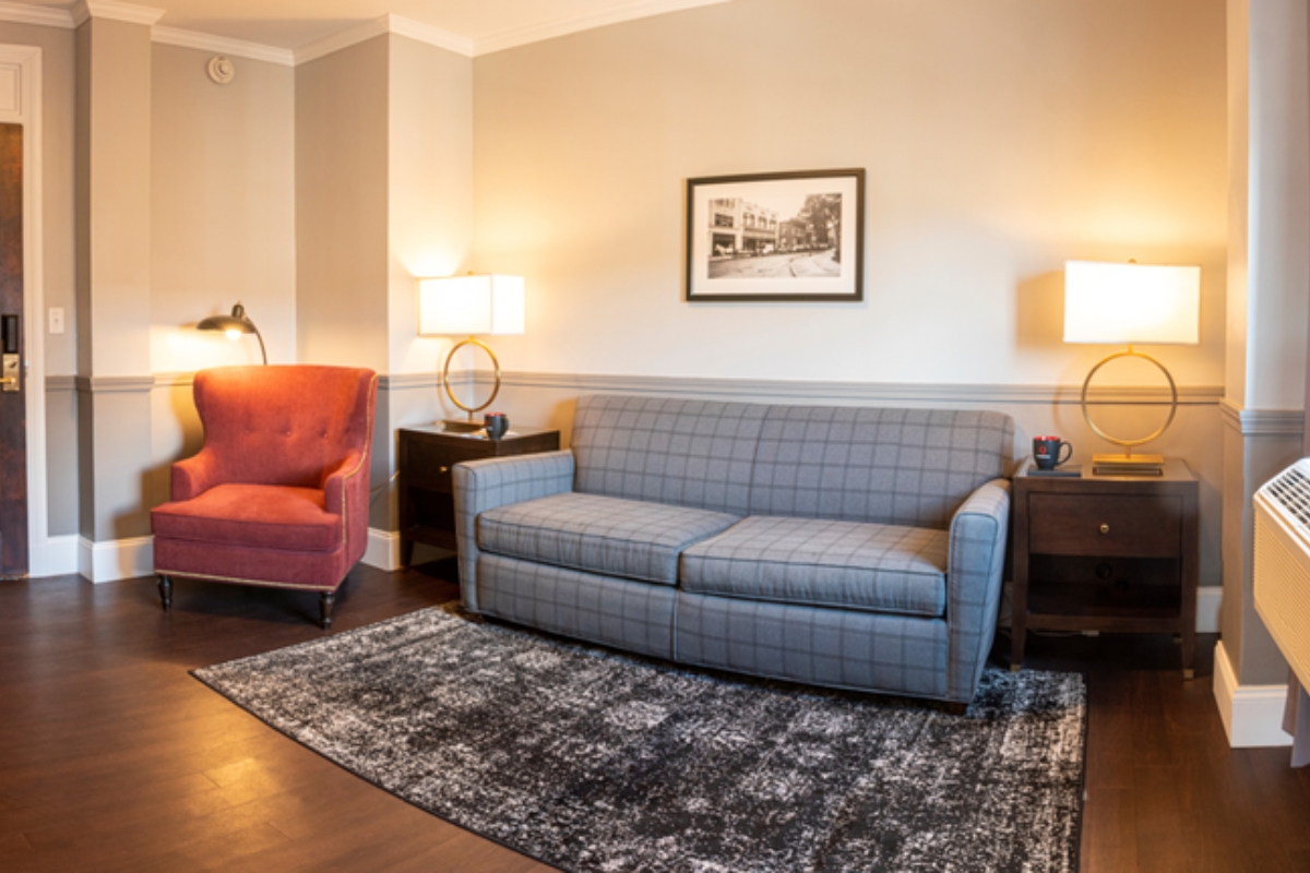 a couch and chairs in a room