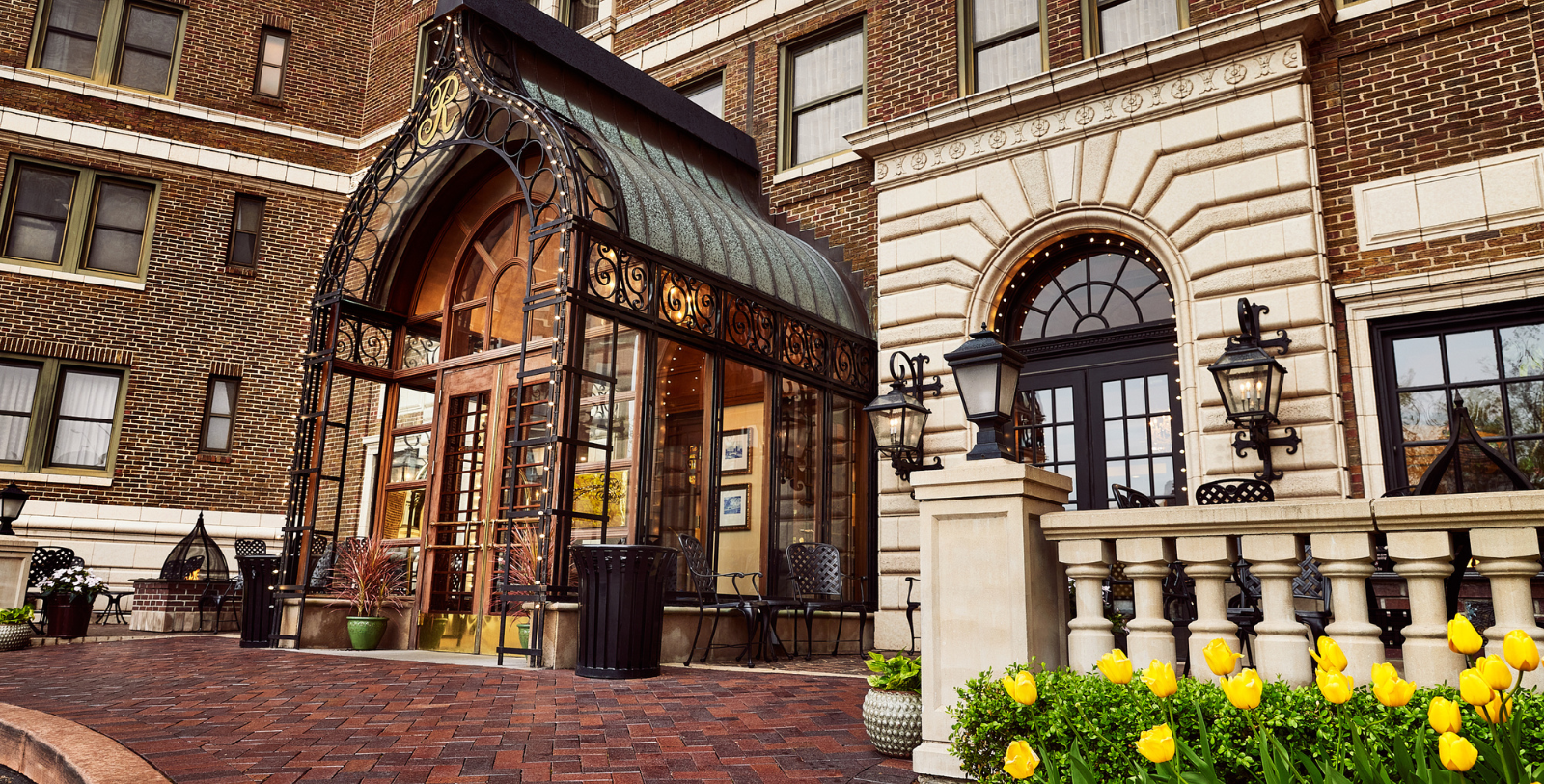 a building with a glass door and a glass awning