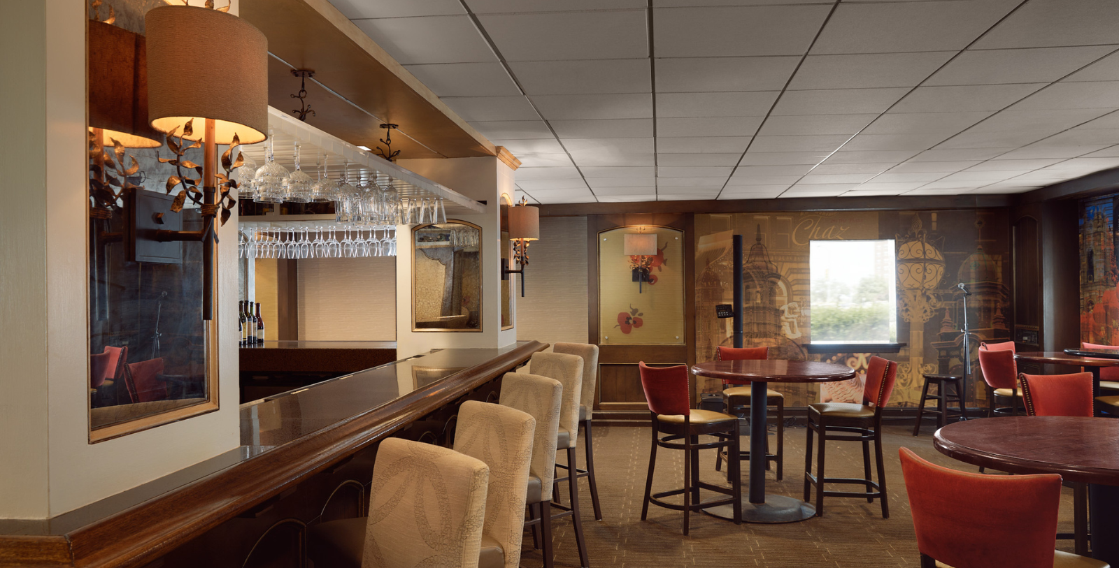 a bar with chairs and a table