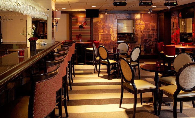 a room with tables and chairs