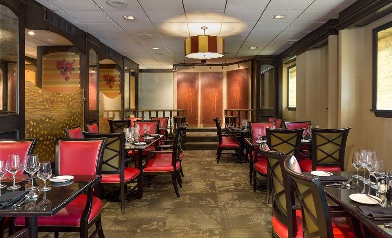 a room with tables and chairs