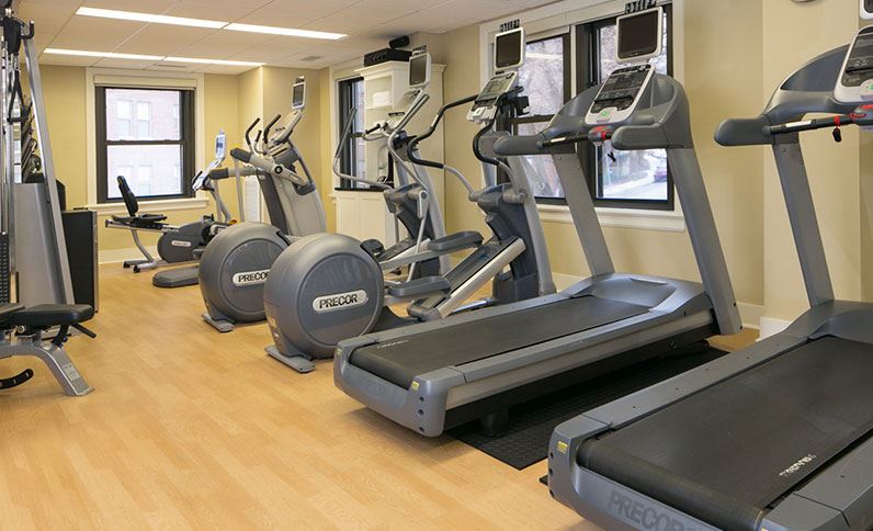 a room with treadmills and treadmills