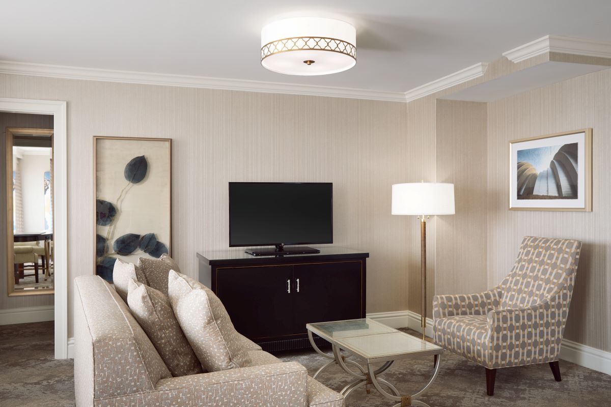 a living room with a tv and couches