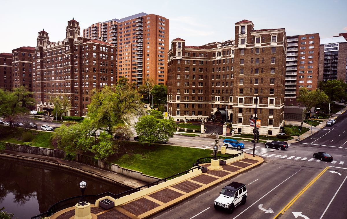 a street with cars and buildings