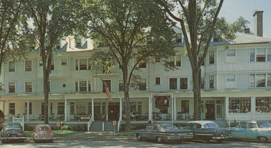 a building with cars parked in front of it