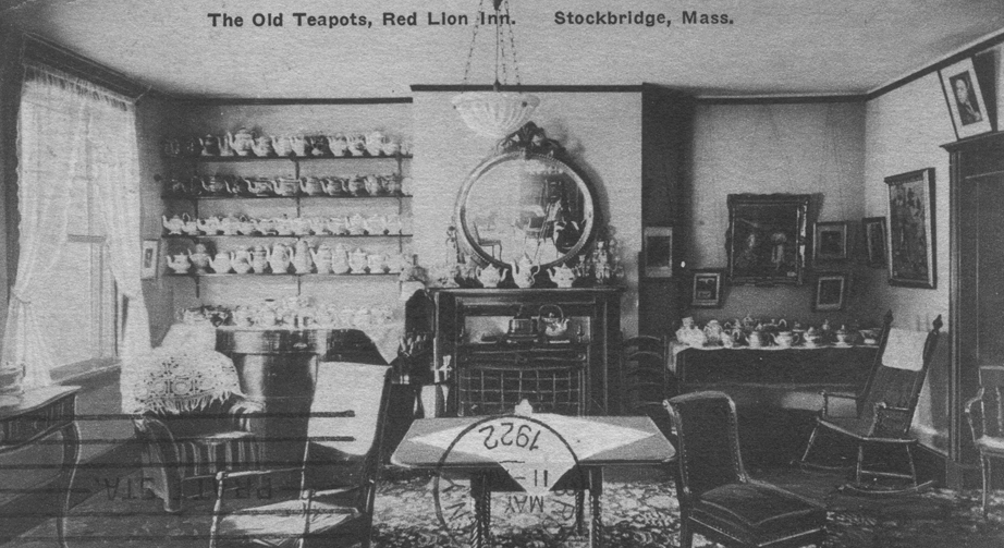 a room with a table and chairs