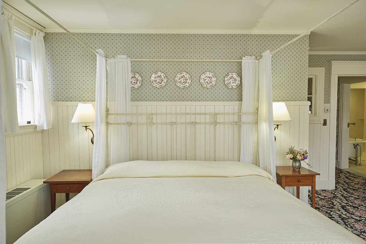 a bed with a canopy over it