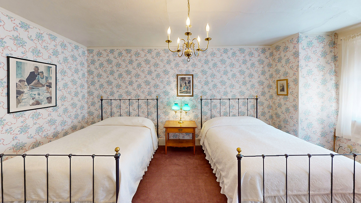 a two beds in a room