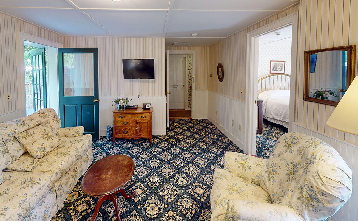 a room with a tv and a couch