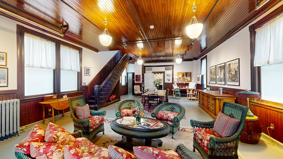 a room with a wood ceiling and a wood ceiling and a wood ceiling