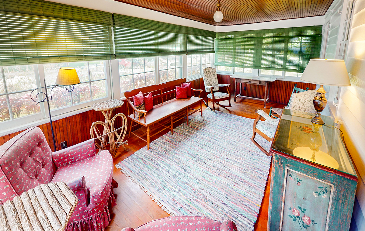 a room with a table and chairs