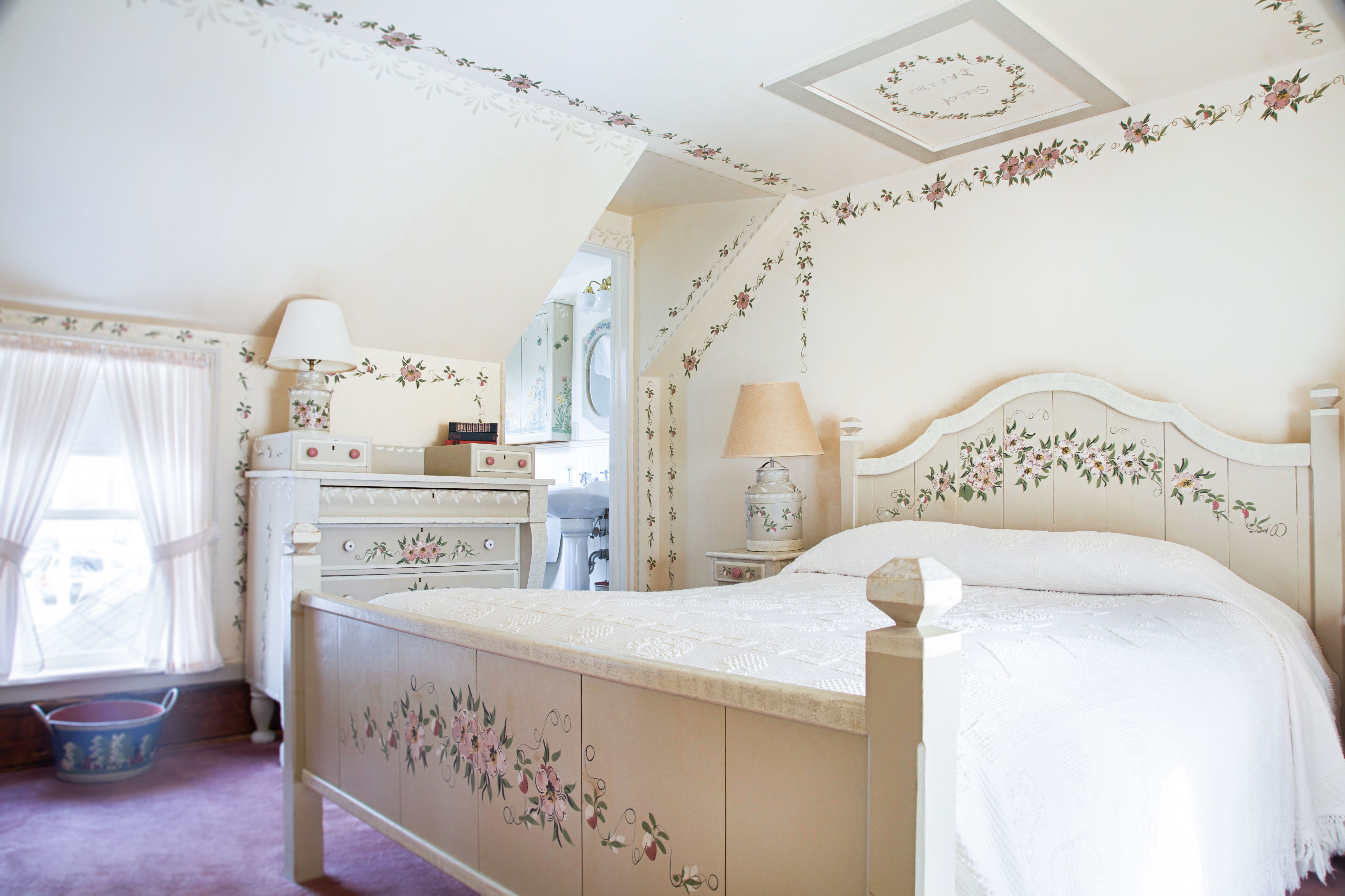a bedroom with a bed and dresser