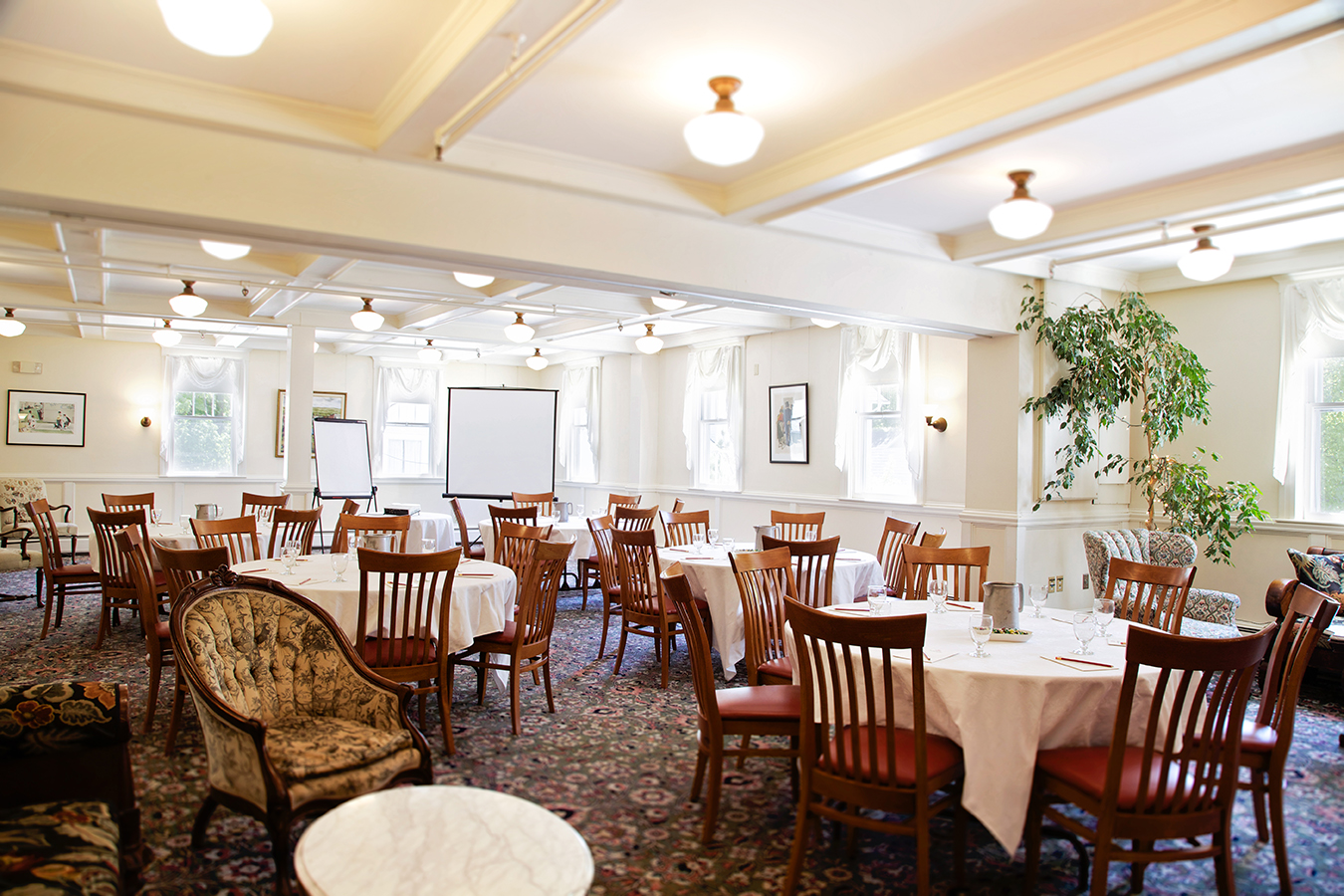 a room with tables and chairs