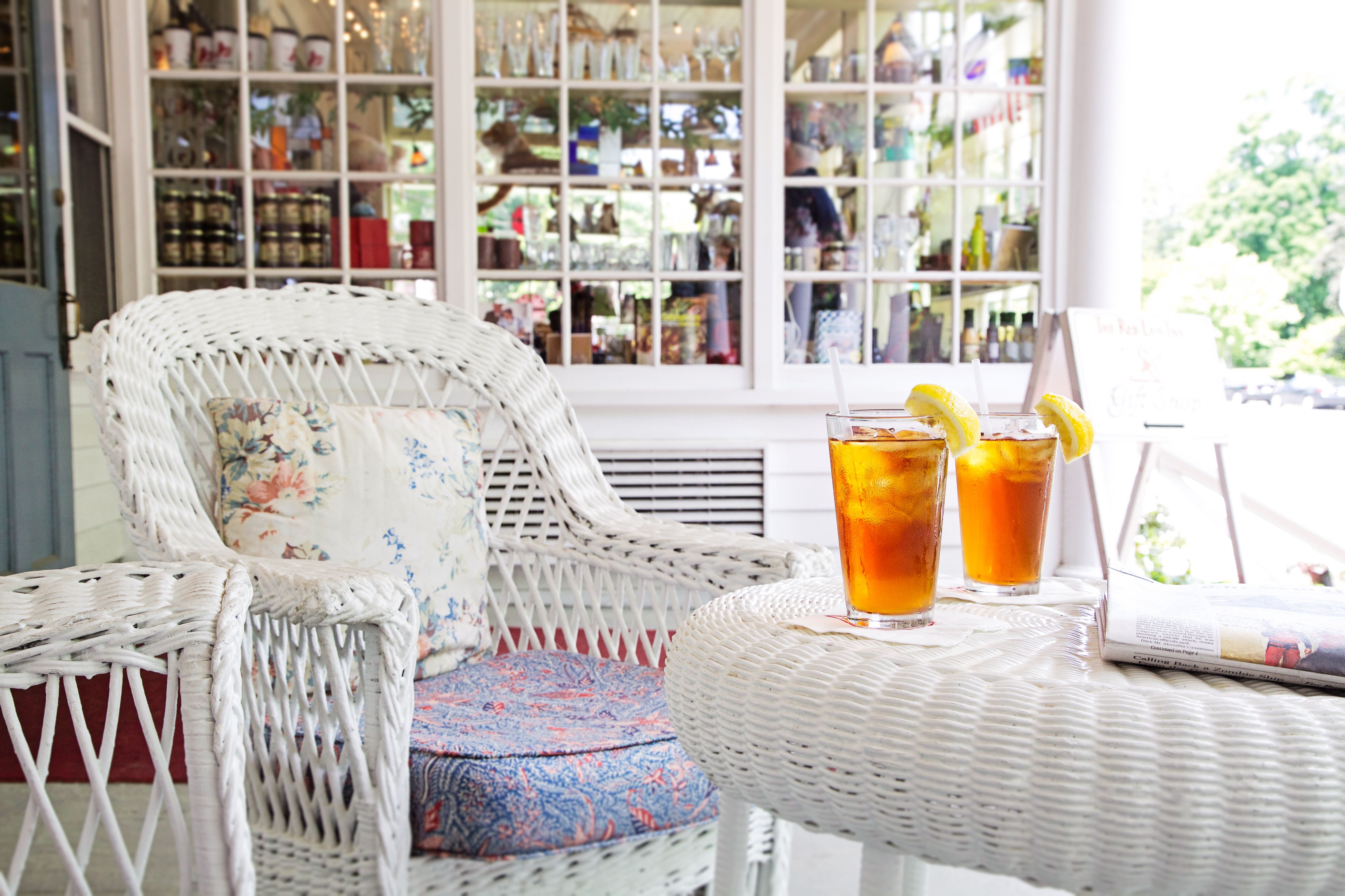 two glasses of ice tea on a table