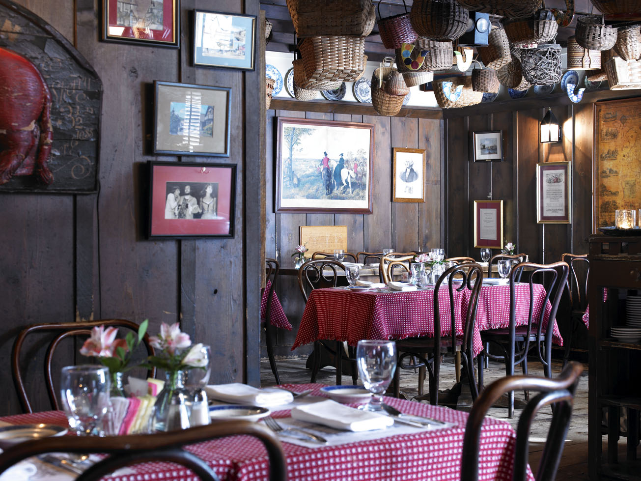 a restaurant with tables and chairs