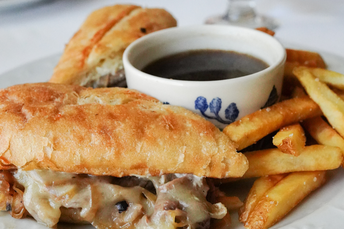 a sandwich and french fries on a plate