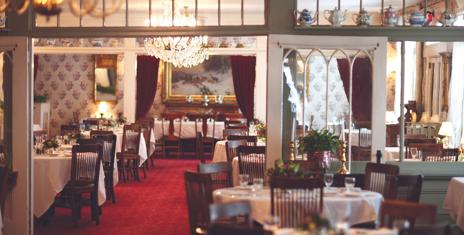 a room with tables and chairs