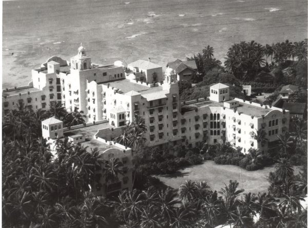 a large building surrounded by trees