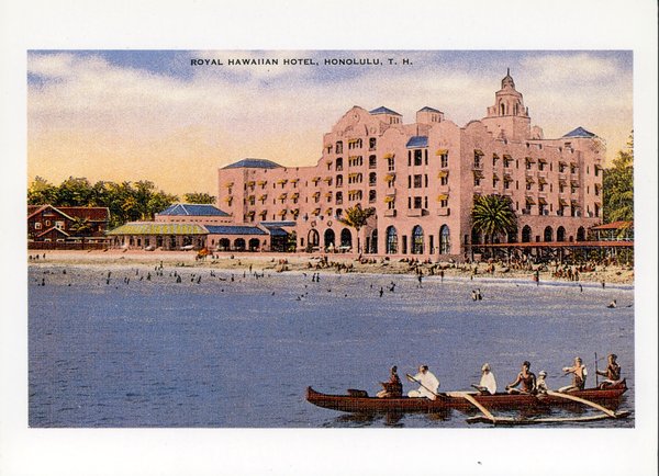 a large building with people in a rowboat on the water