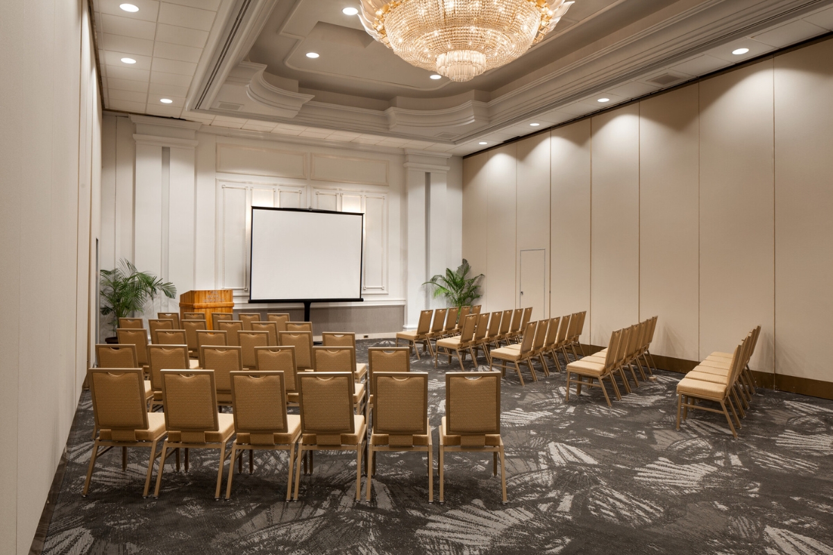 a room with chairs and a projector