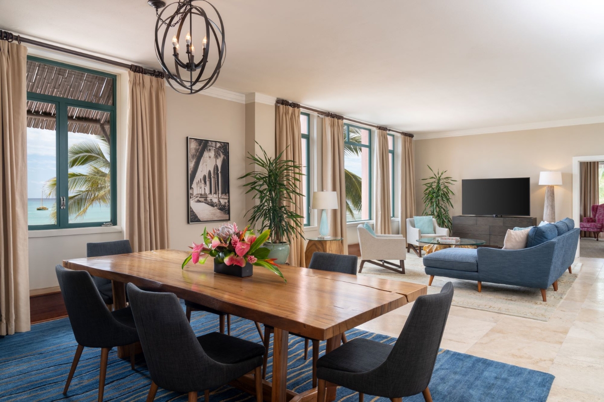 a room with a table and chairs