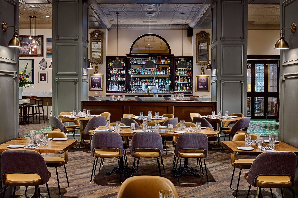 a restaurant with tables and chairs