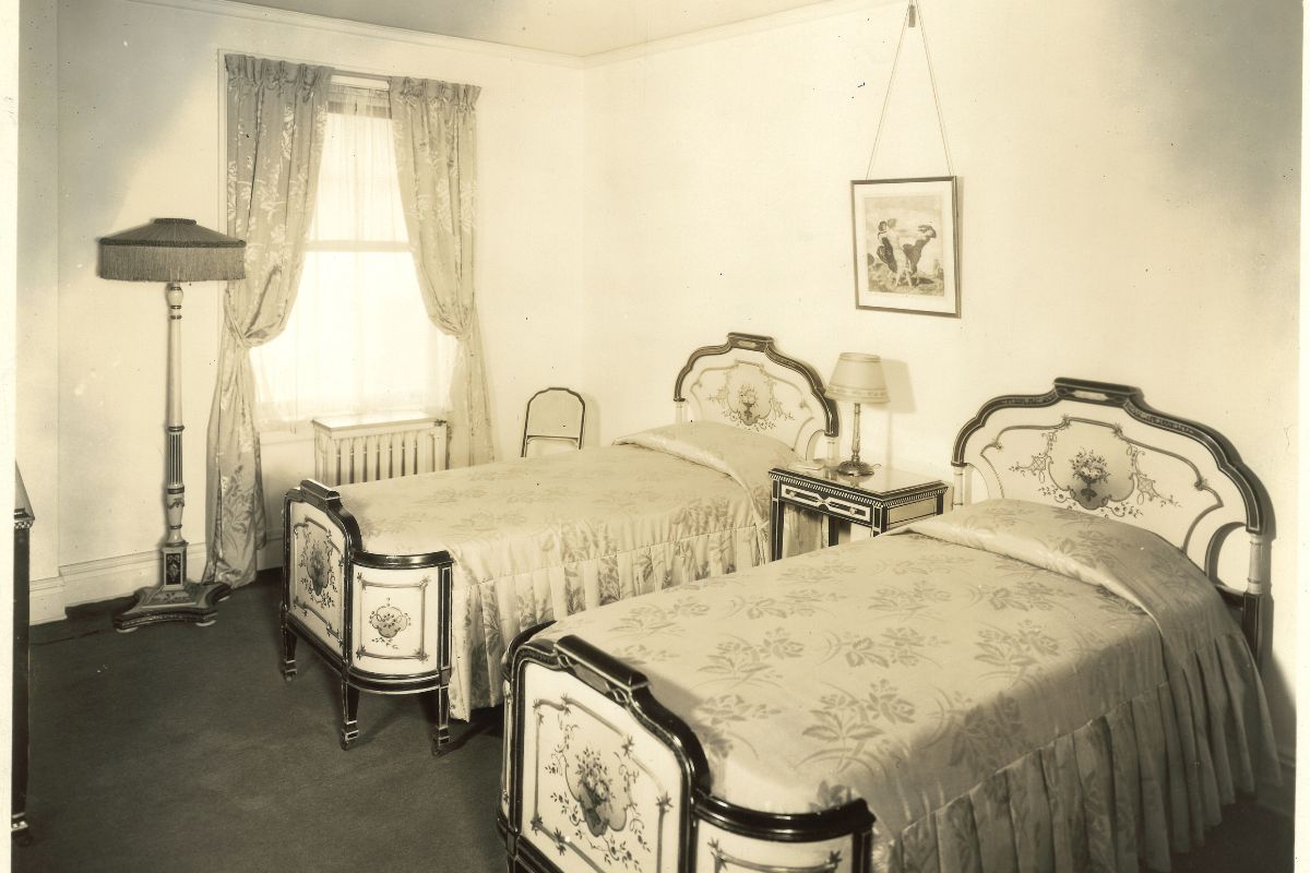 a bedroom with two beds