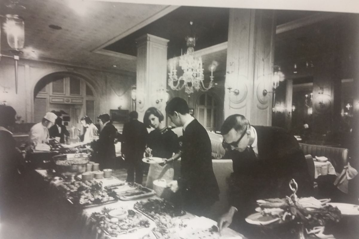 a group of people at a buffet