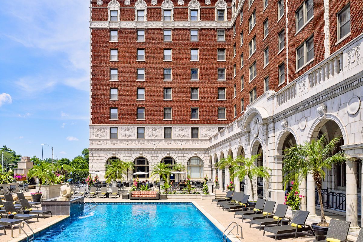 a pool in front of a building