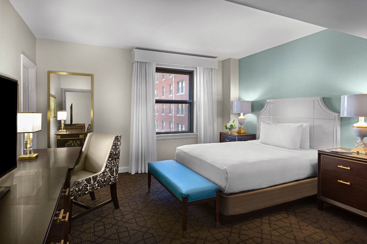 a room with a bed and a table