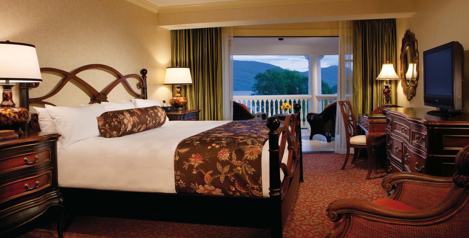 a hotel room with a large bed