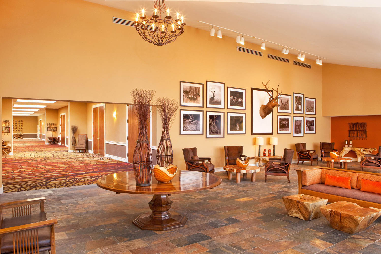 a room with a large table and chairs