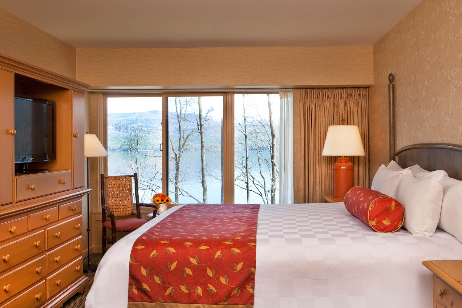 a room with a bed and a chair