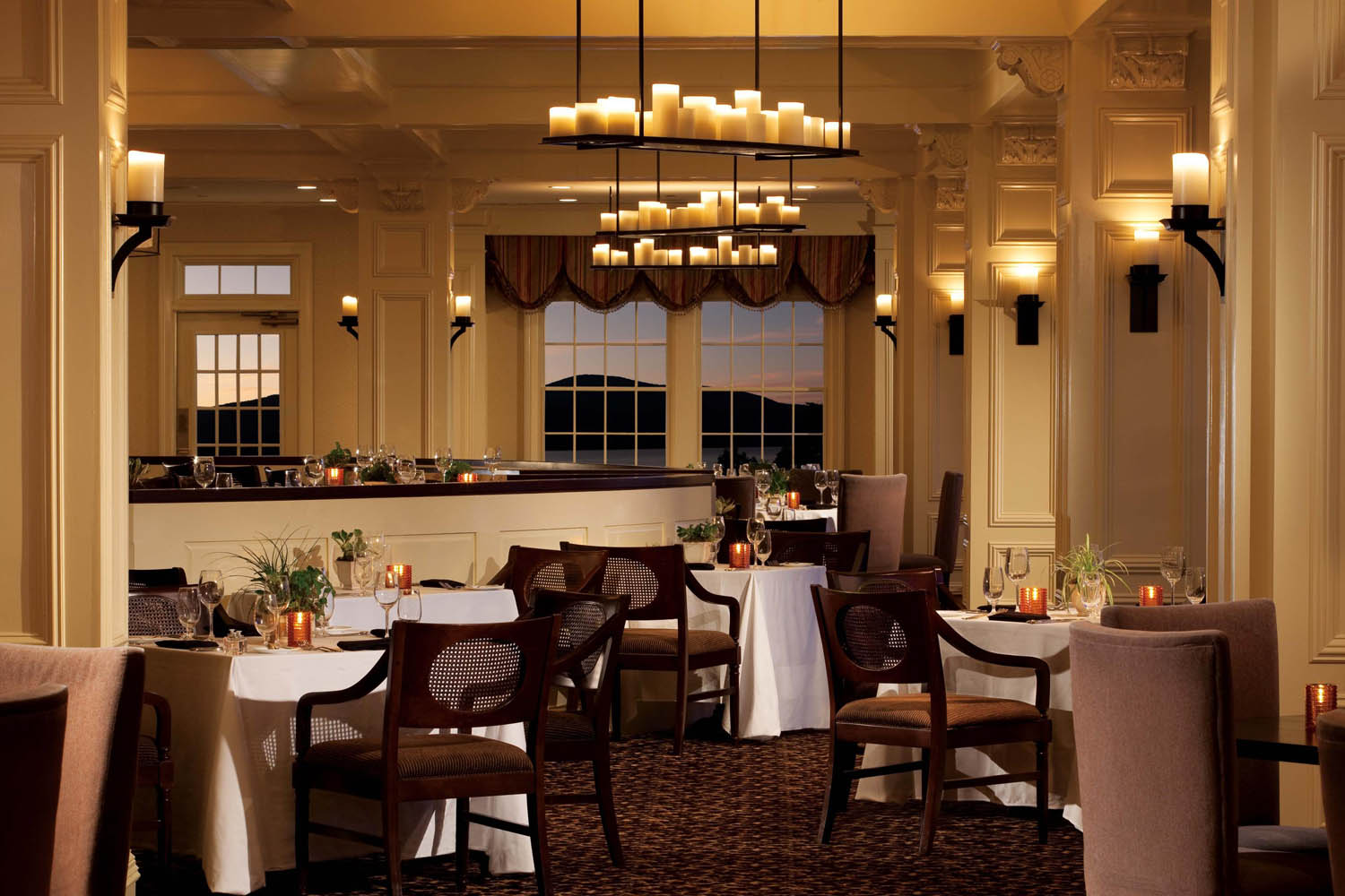 a restaurant with tables and chairs