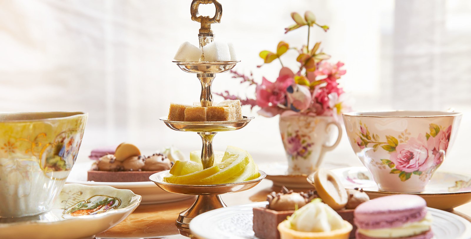 a tiered tray with food on it