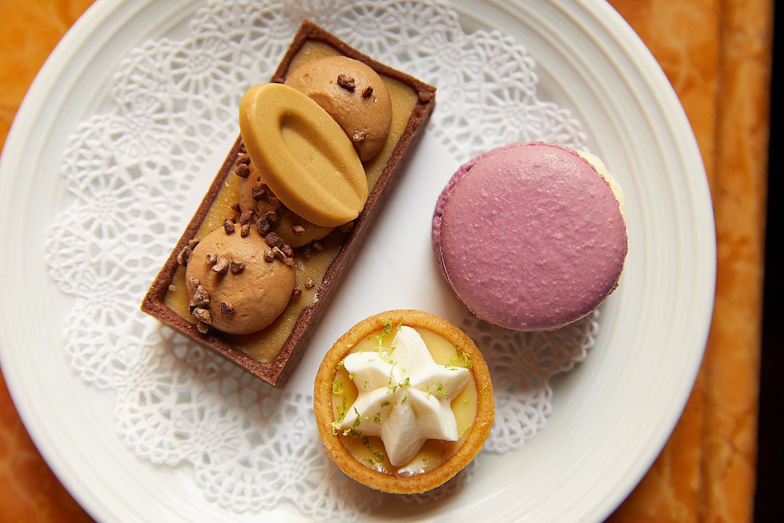 a plate of desserts on a table