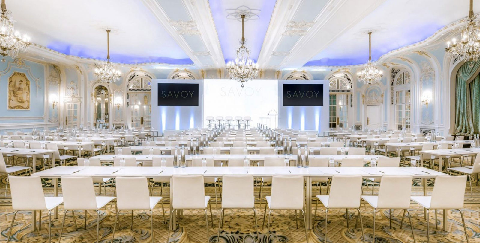 a room with tables and chairs