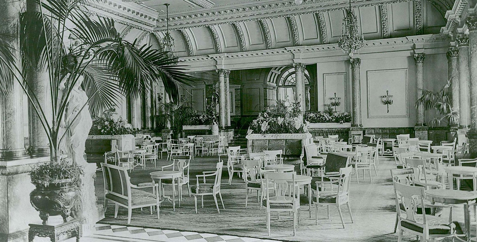 a room with chairs and tables