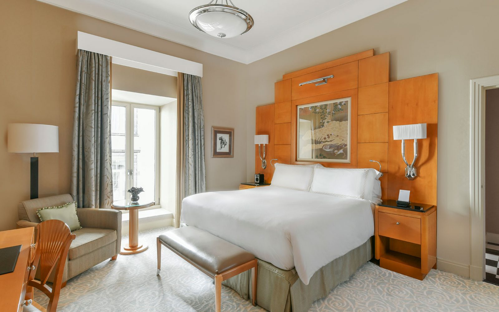 a room with a bed and a chair