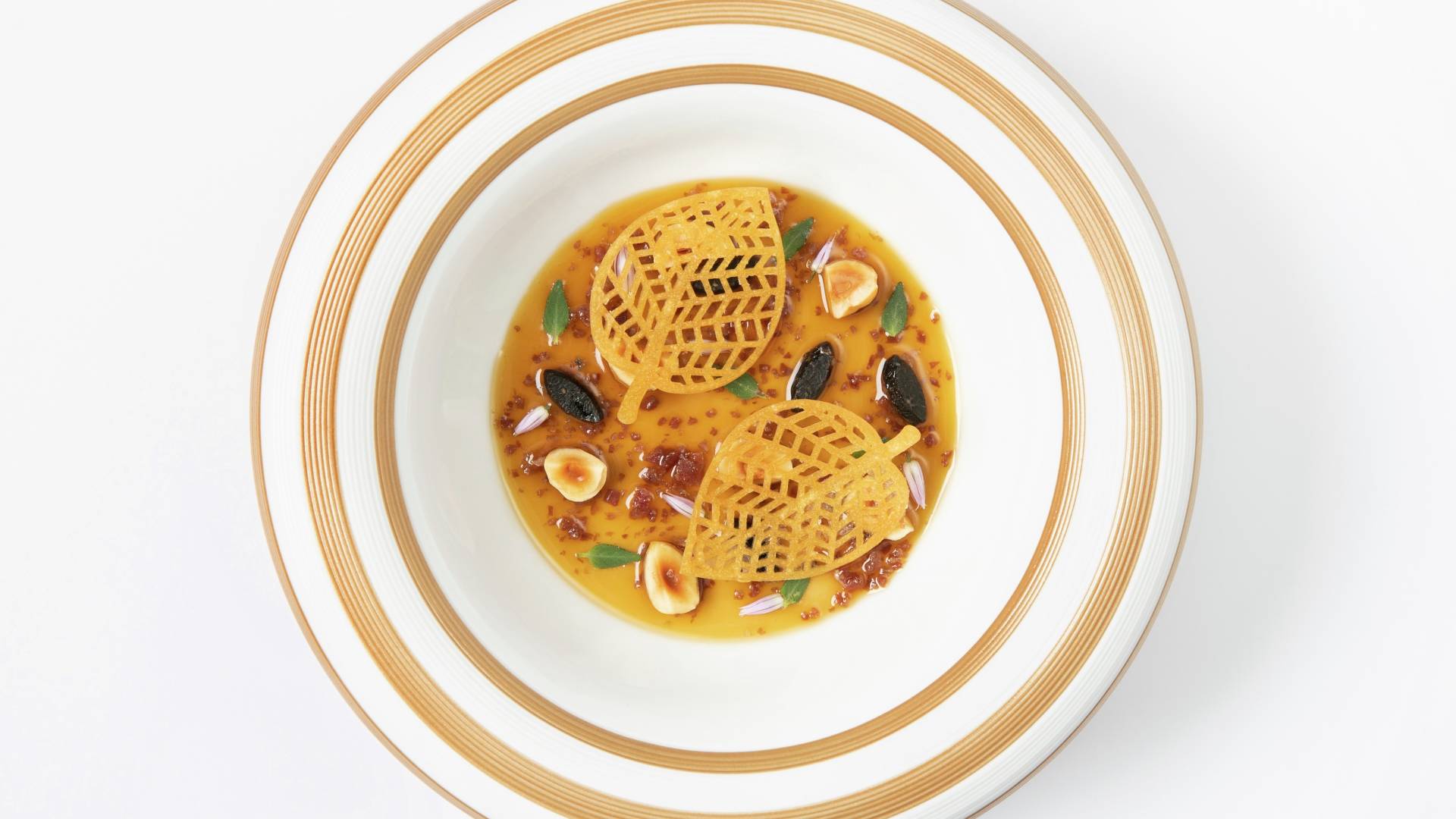 a plate of food with a white rim