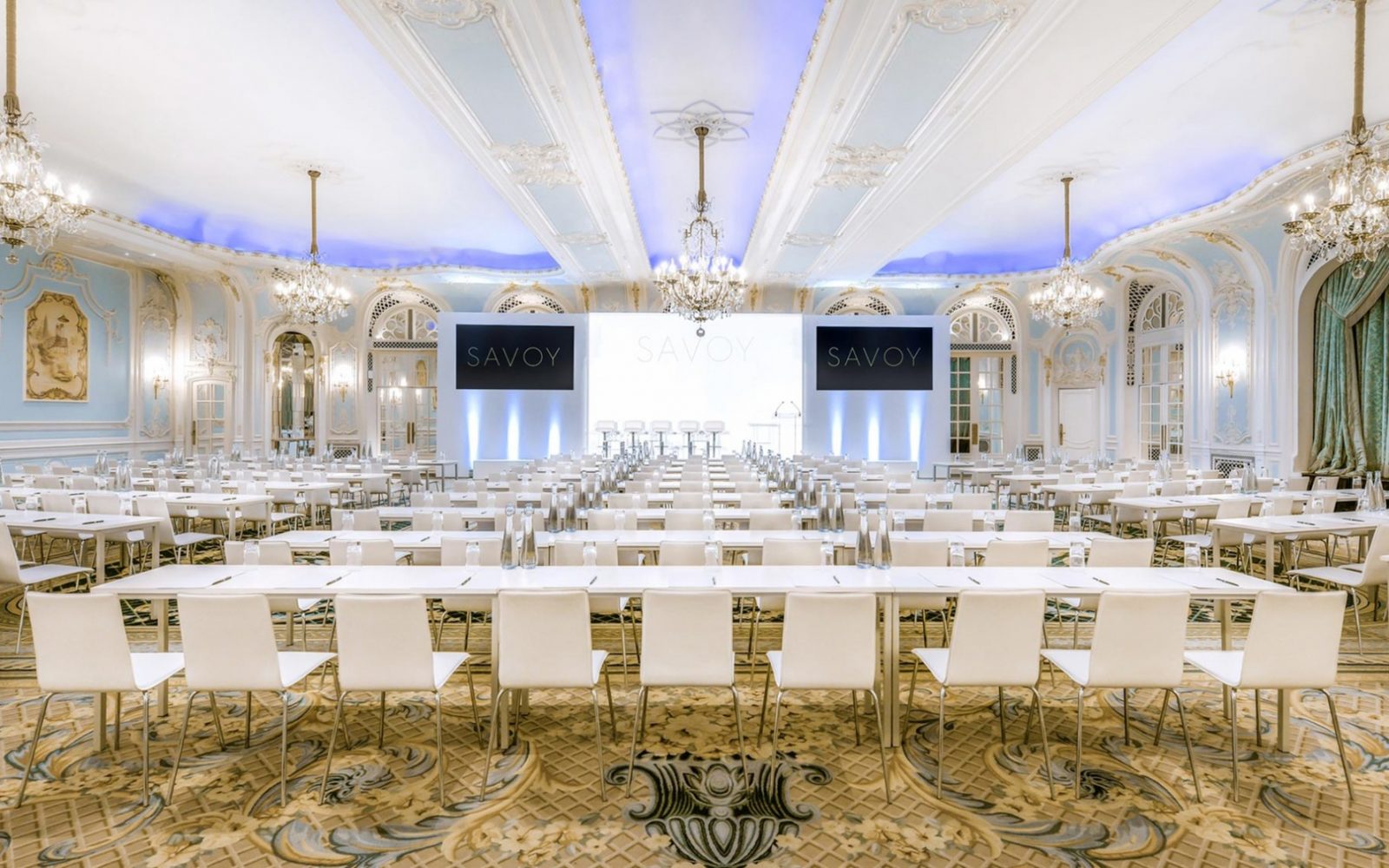 a room with tables and chairs