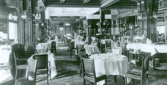 a restaurant with tables and chairs