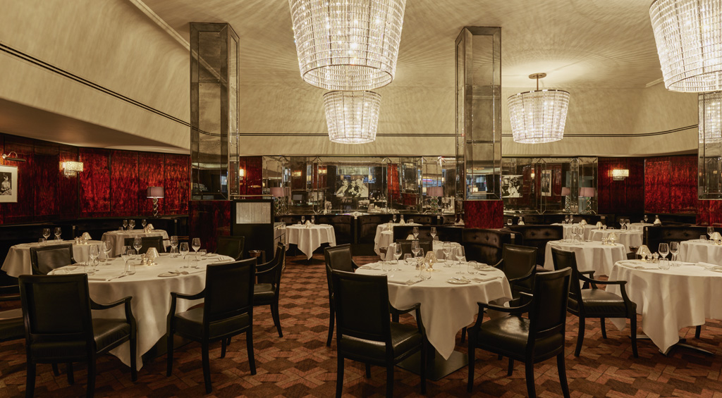 a restaurant with tables and chairs