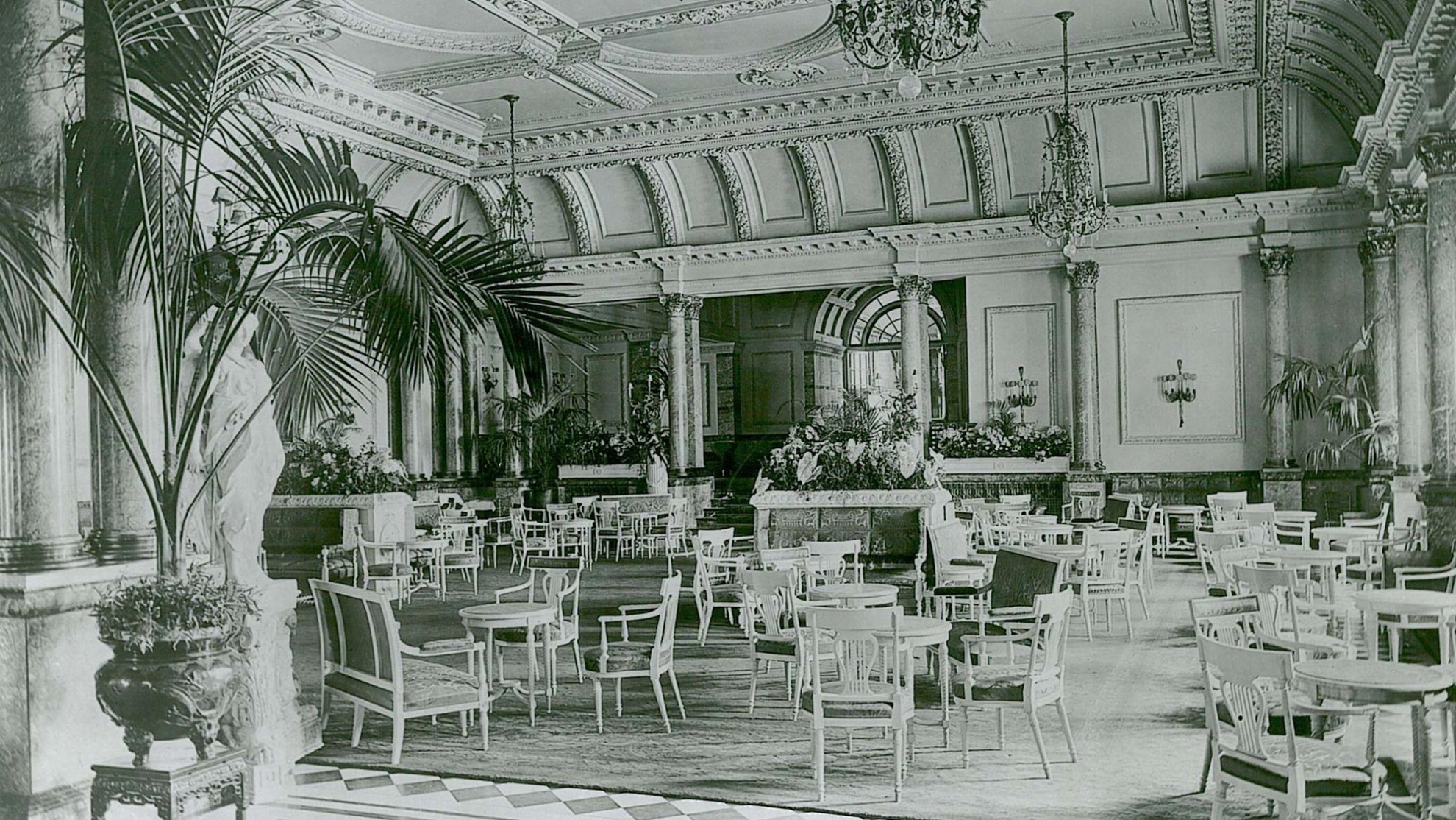 a room with chairs and tables
