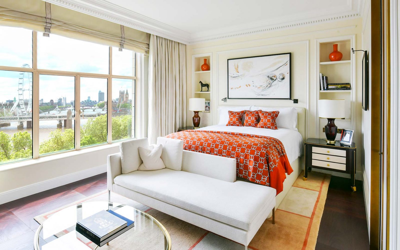 a bedroom with a bed and a couch
