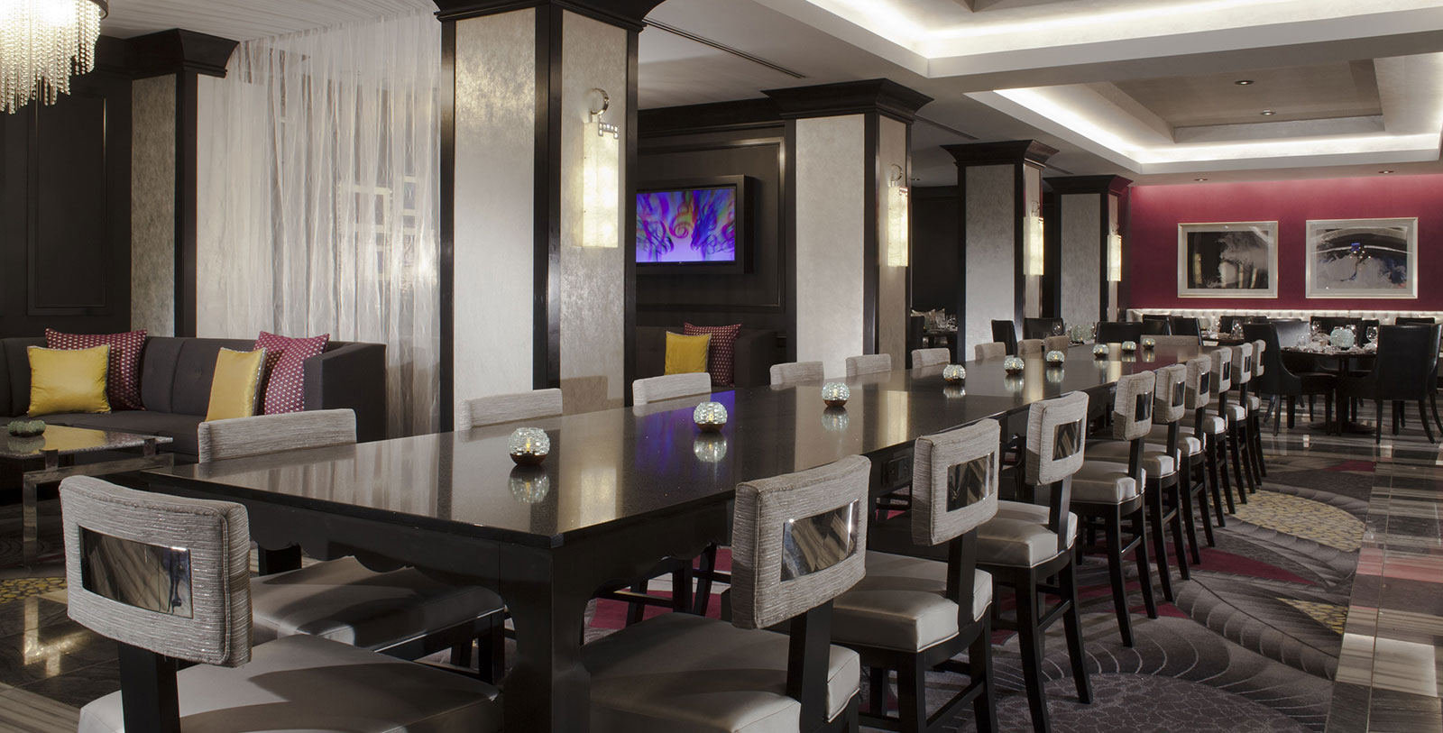 a long table with chairs in a room