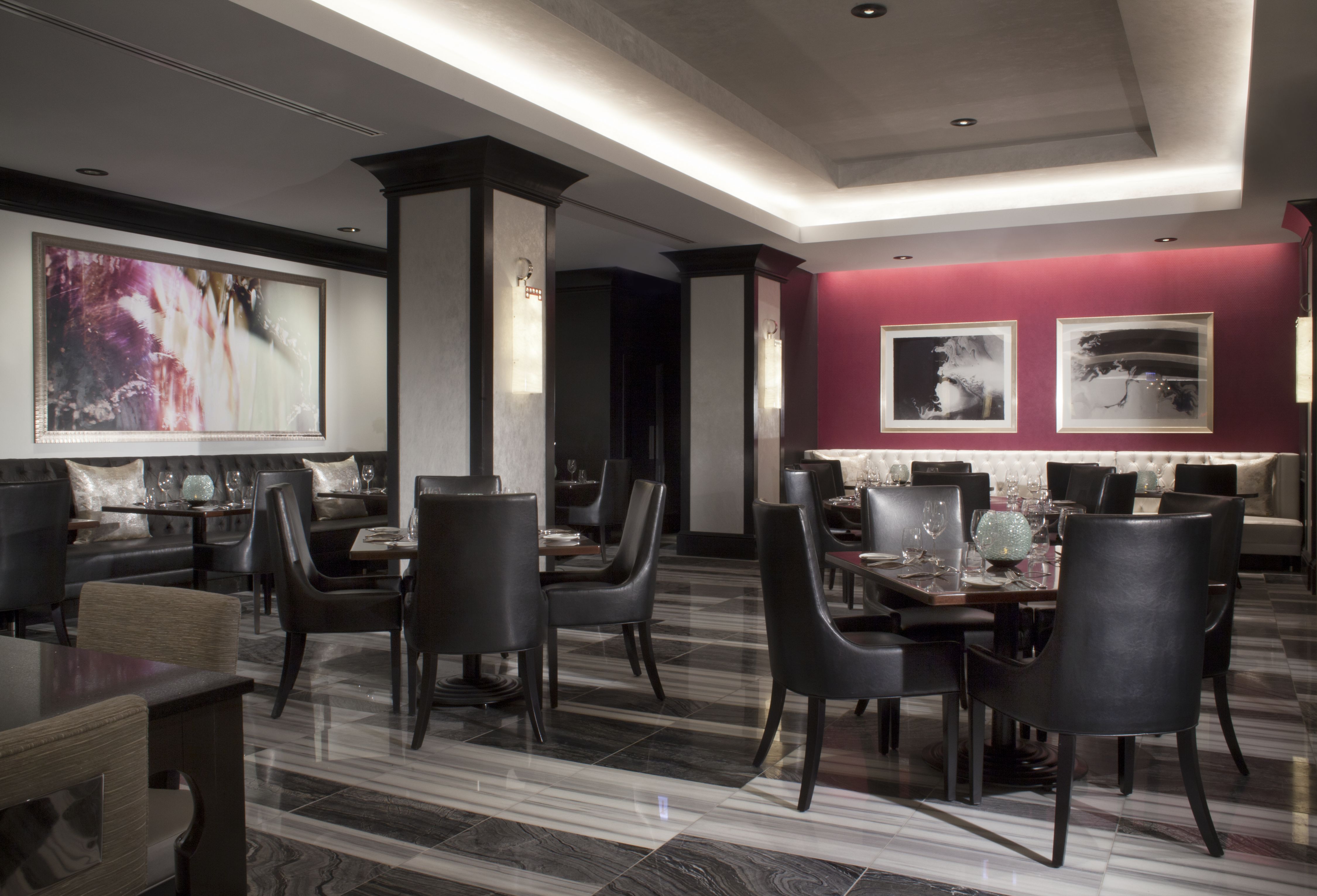 a restaurant with tables and chairs