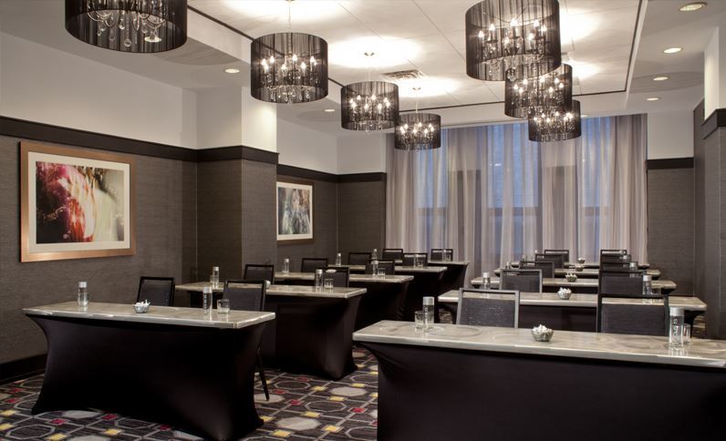 a room with tables and chairs