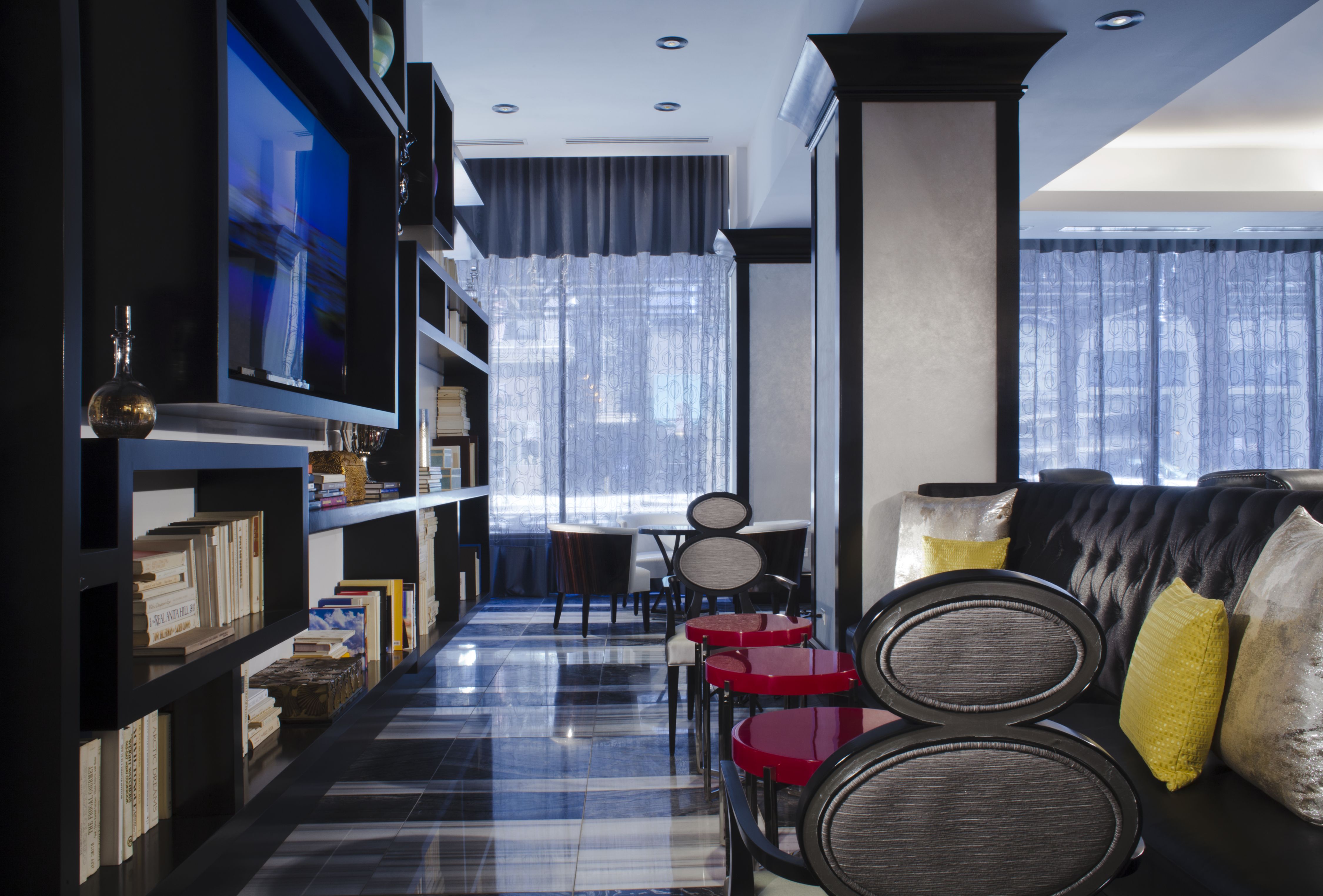 a room with a tv and a couch