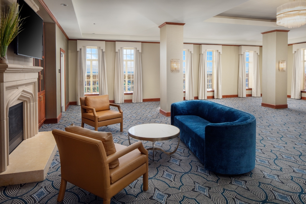 a room with couches and chairs